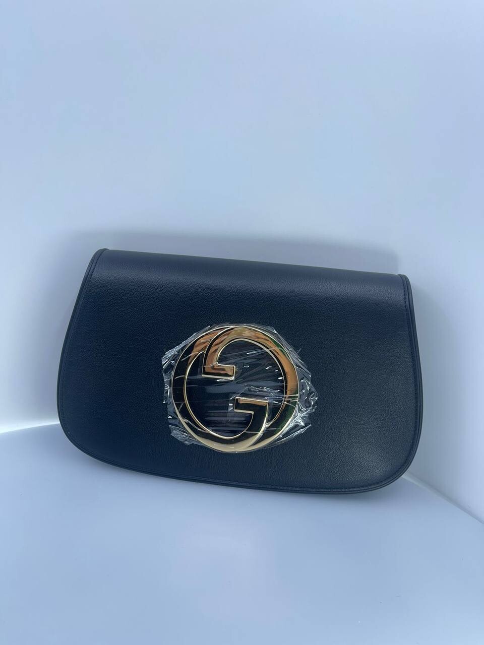 GC silver logo black bag