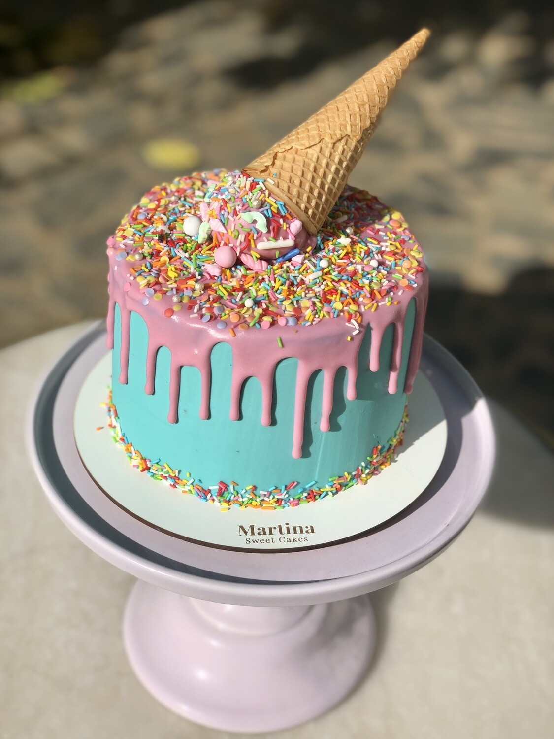 Dripping ice cream cone cake