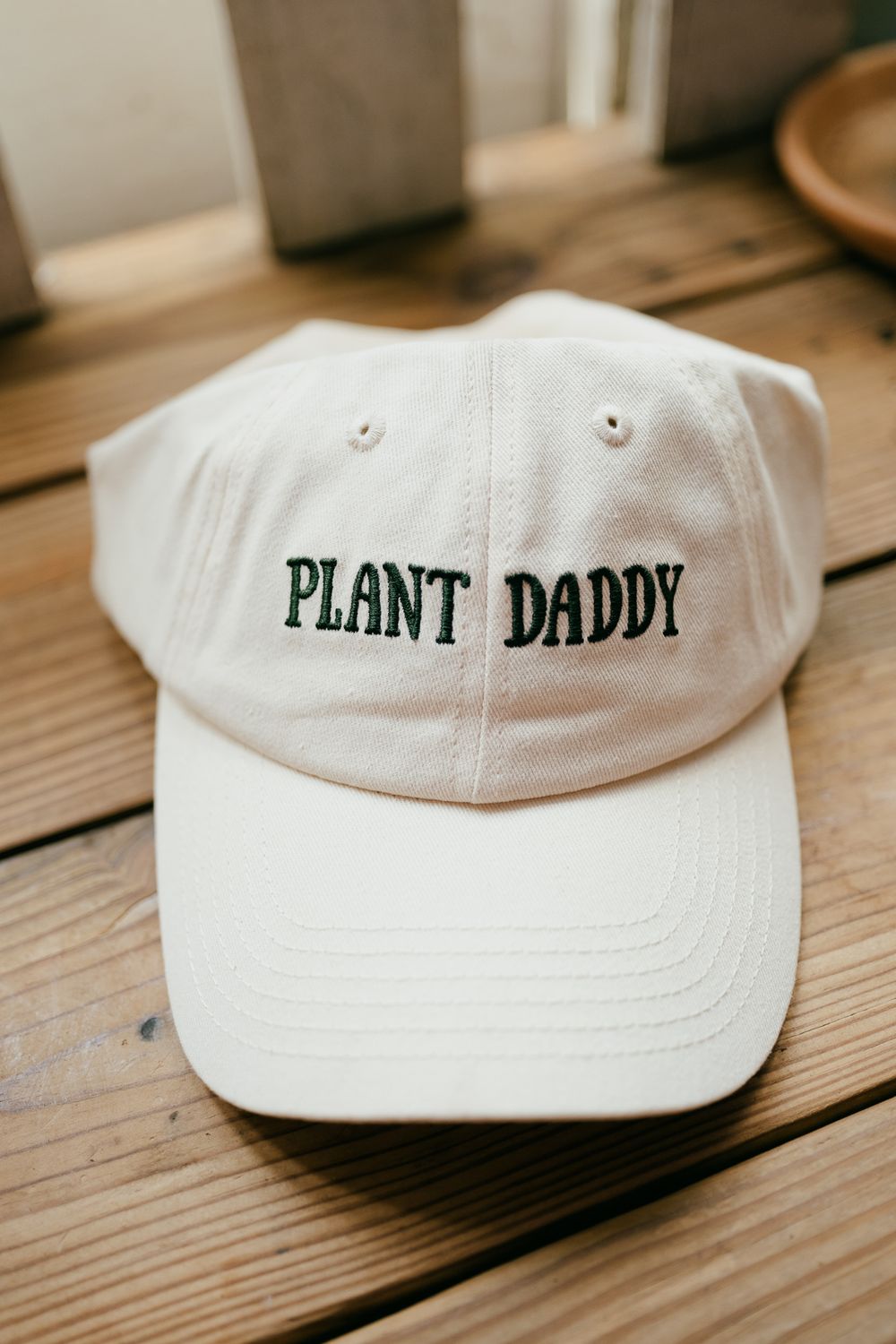 cream plant daddy cap