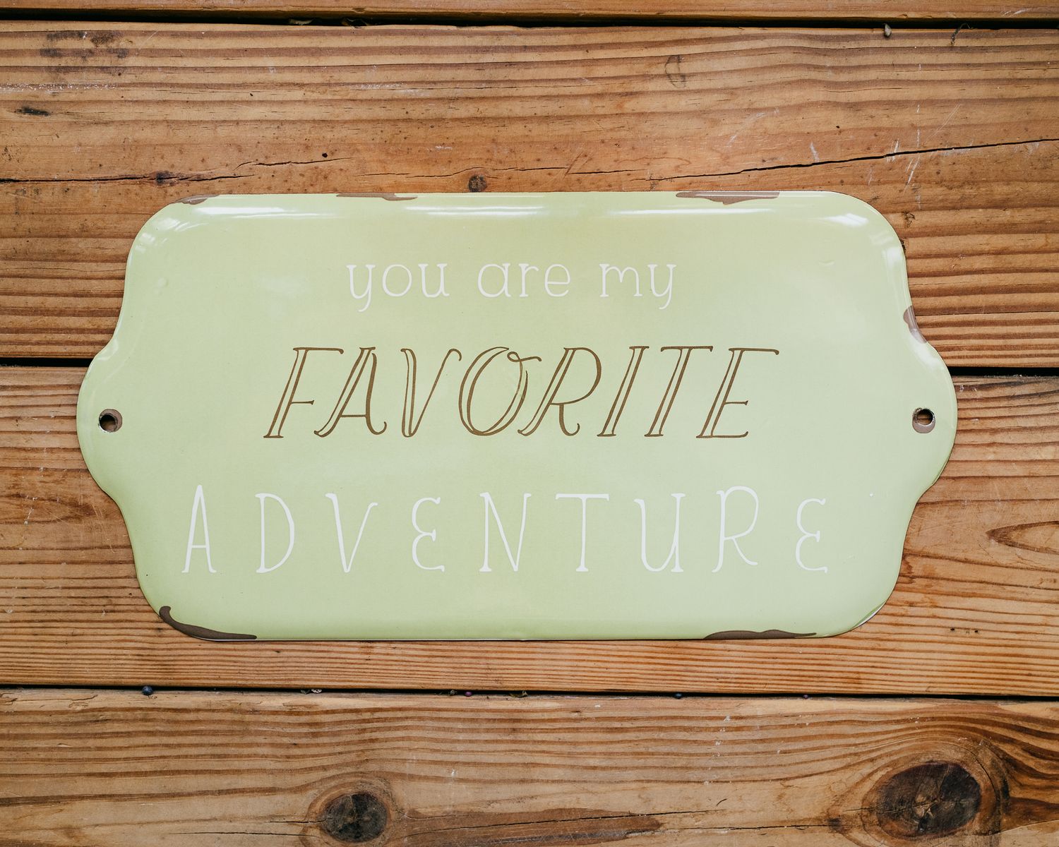 metal adventure sign
