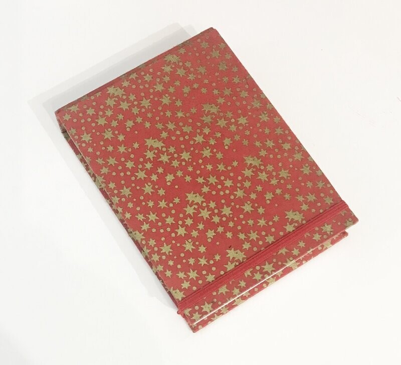 Gold stars on red deskpad by Stuart McLaughlan