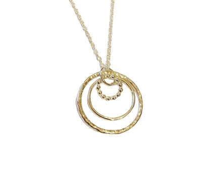 Triple circle pendant by Diana King