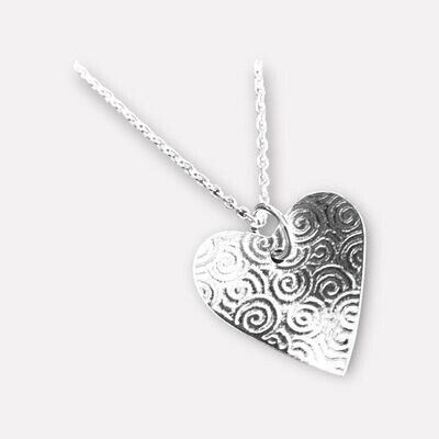 Spiral textured heart pendant by Margaret Rae