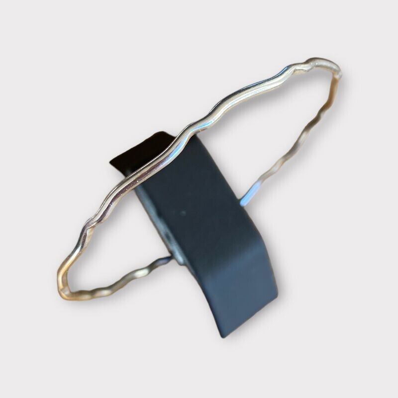 Silver fancy wave bangle by Margaret Rae