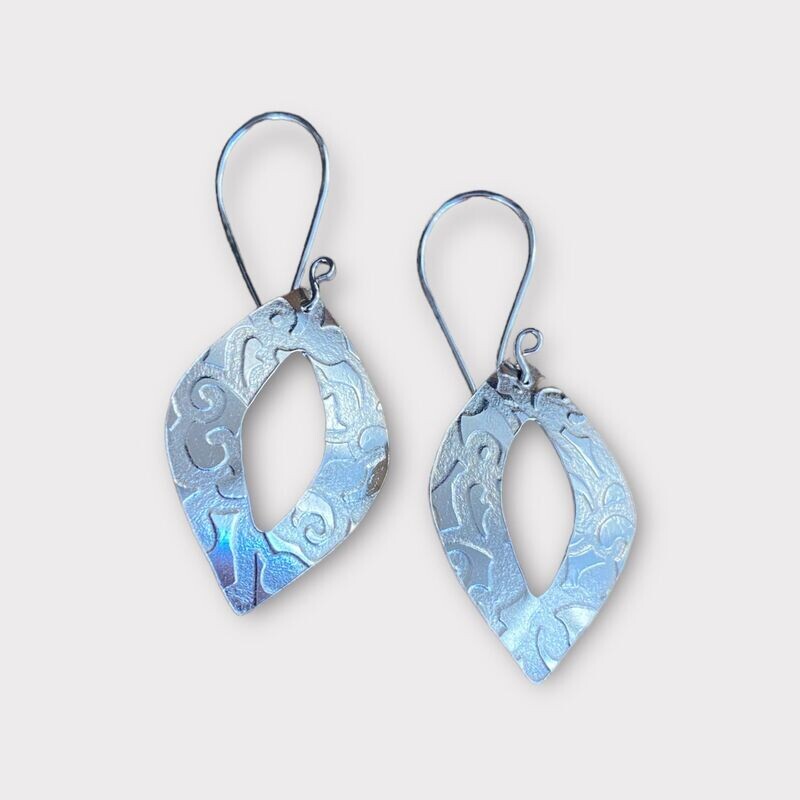 Embossed cut out earrings by Margaret Rae