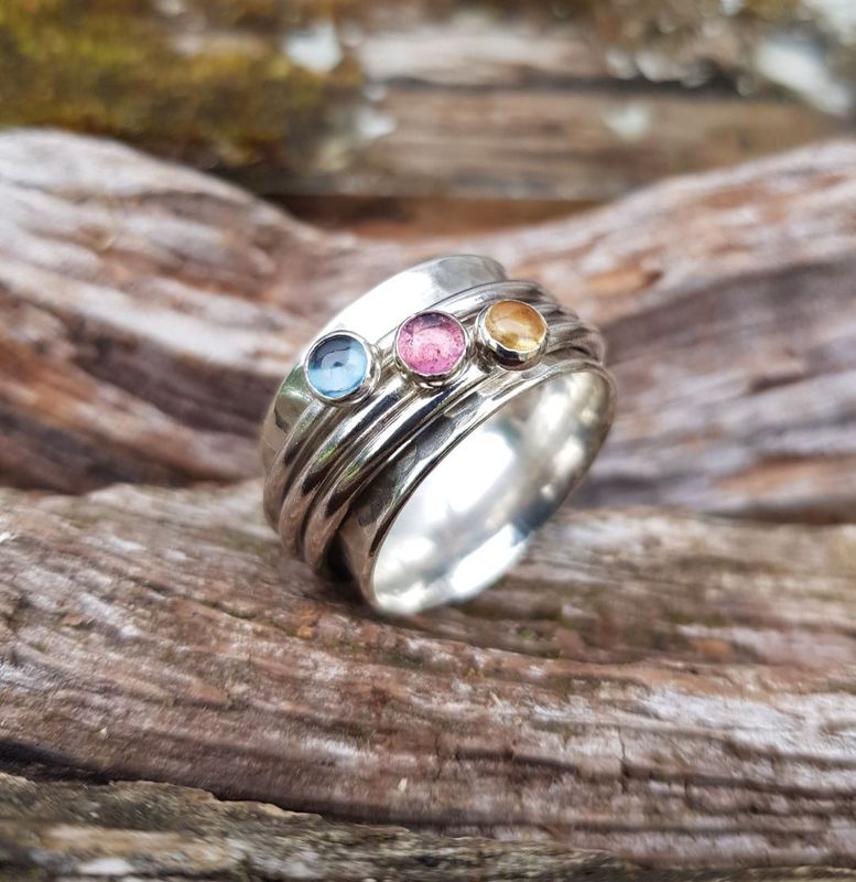 Multi gem spinner ring by Silverpickle