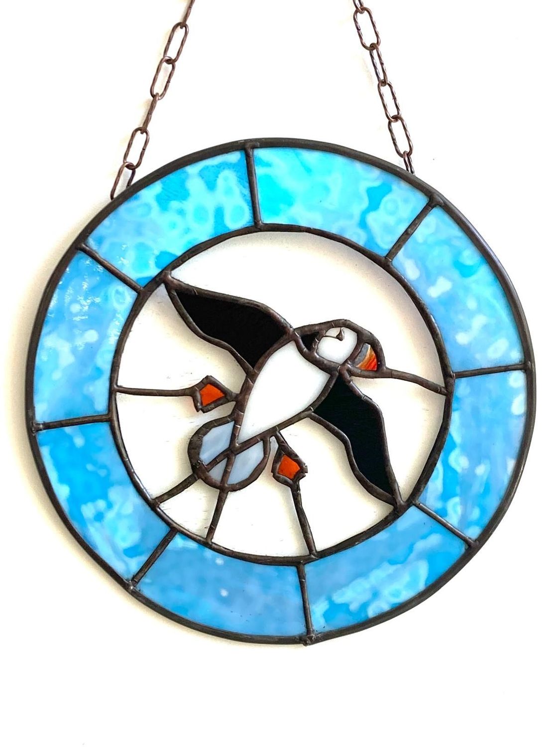 Puffin round panel by Lorna C Radbourne