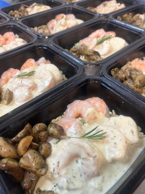 Scampi met lookroom & orzo