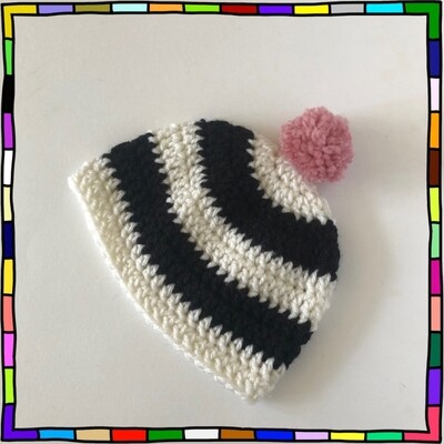 "Kids black and white stripe hand crocheted beanie hat with dusty pink pompom"