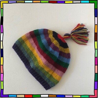 "Toddler vibrant shades of red, navy blue, gold, purple, sky blue, green, burgundy, dusty pink, yellow, apple green, dusty blue, and violet stripe hand knit beanie hat with tassels"

