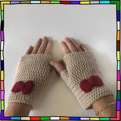 "Women's soft feel beige hand crocheted fingerless gloves adorned with dark red bows"