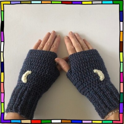 "Women's midnight blue hand crocheted fingerless gloves which are adorned with cream half moon motifs" 