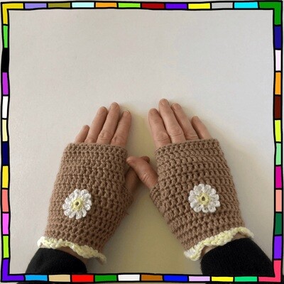 "women's dessert taupe handmade crochet fingerless gloves, adorned with yellow and white daisy flower motifs and a matching shell edging"