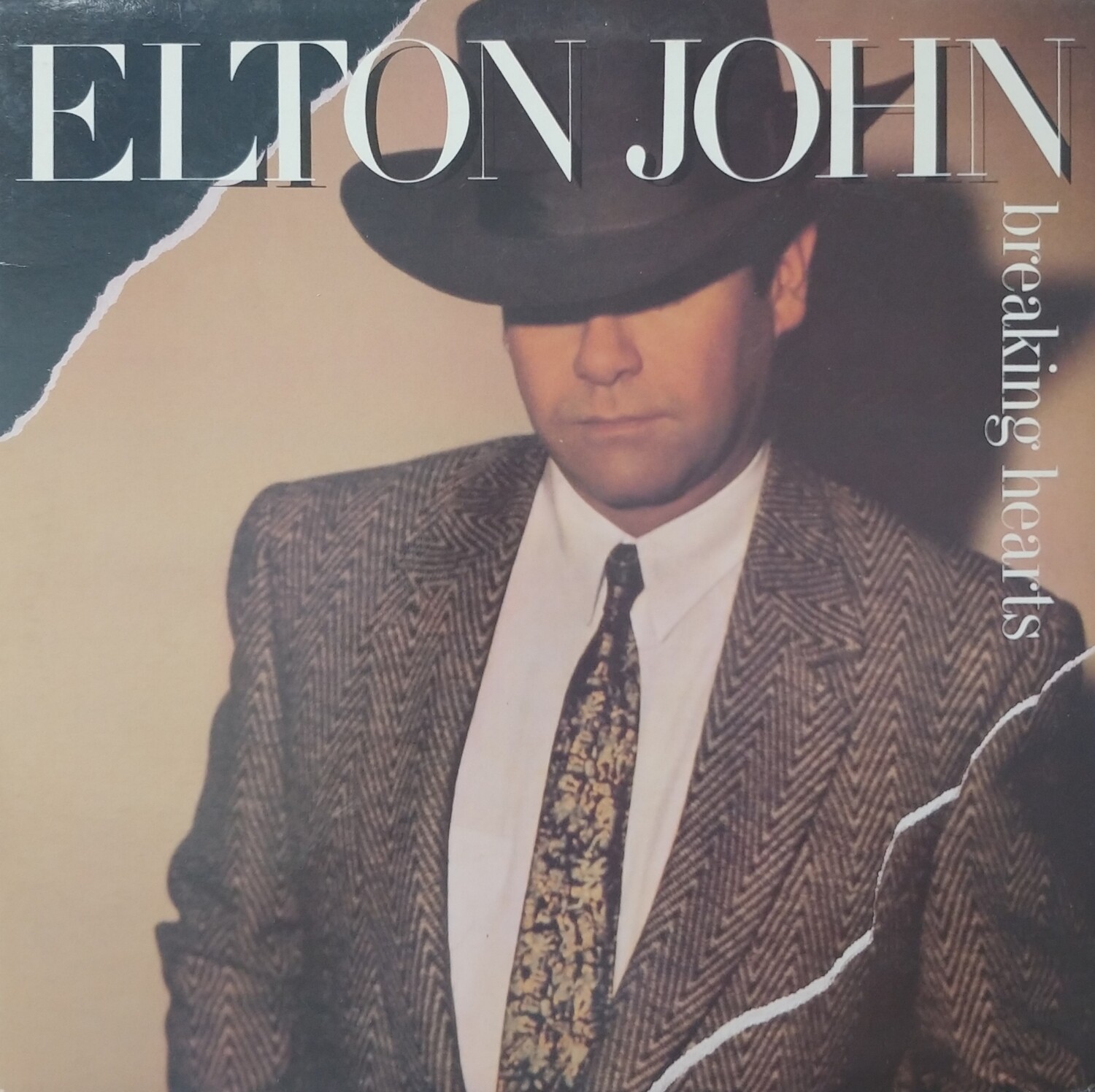 Elton John - Breaking hearts