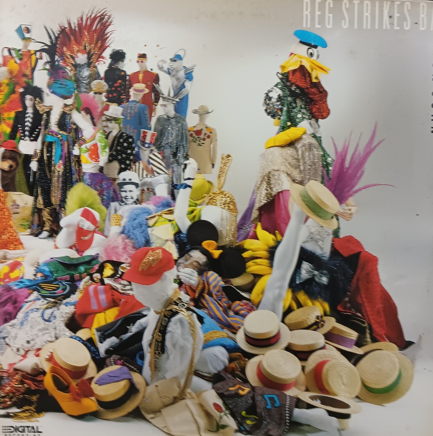 ELTON JOHN - Reg Strikes Back