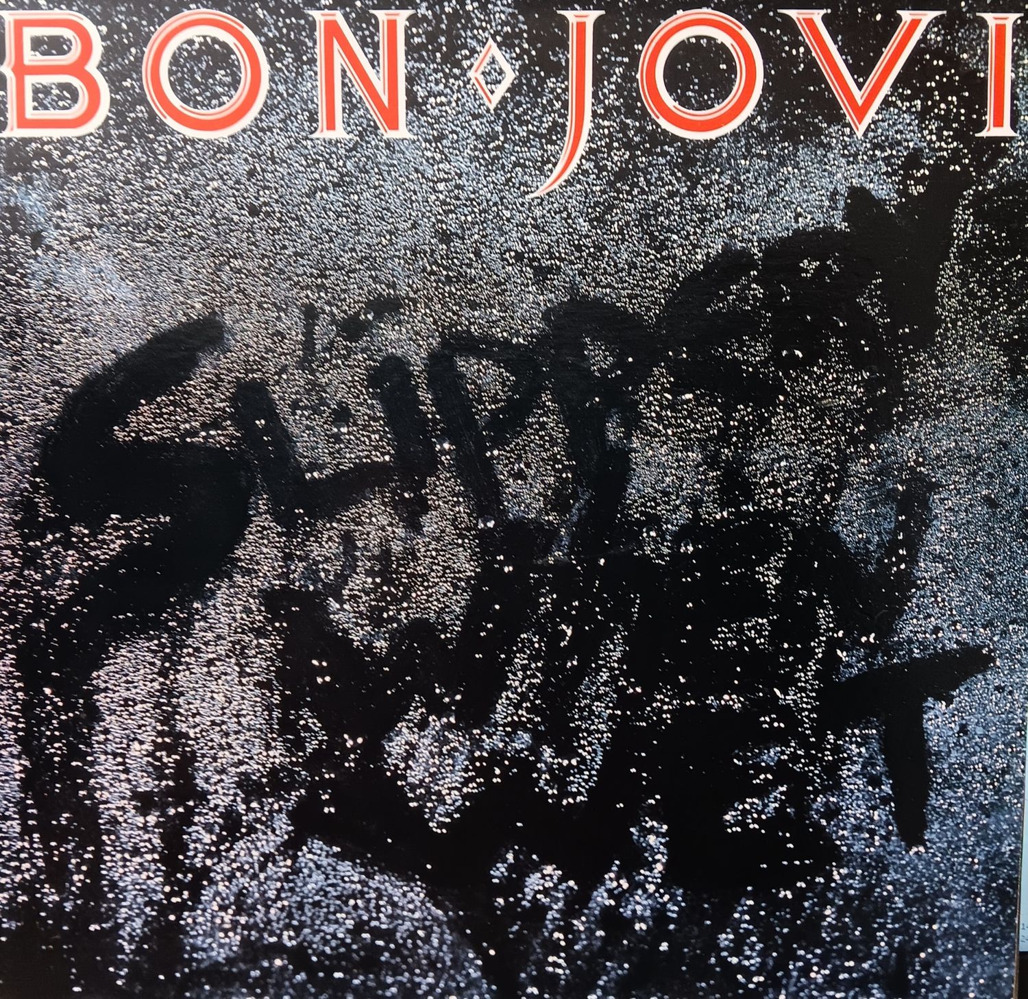 BON JOVI - Slippery when wet