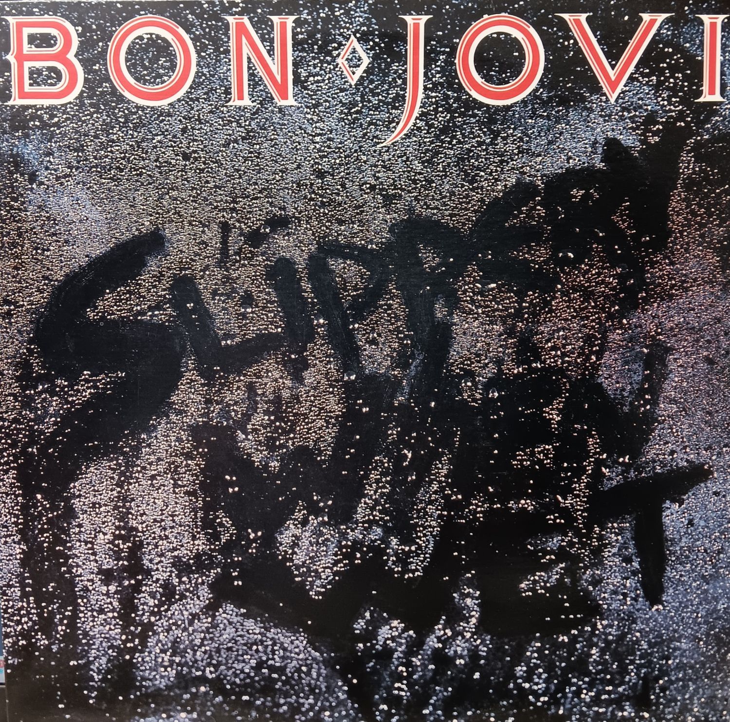 BONJOVI - Slippery when wet