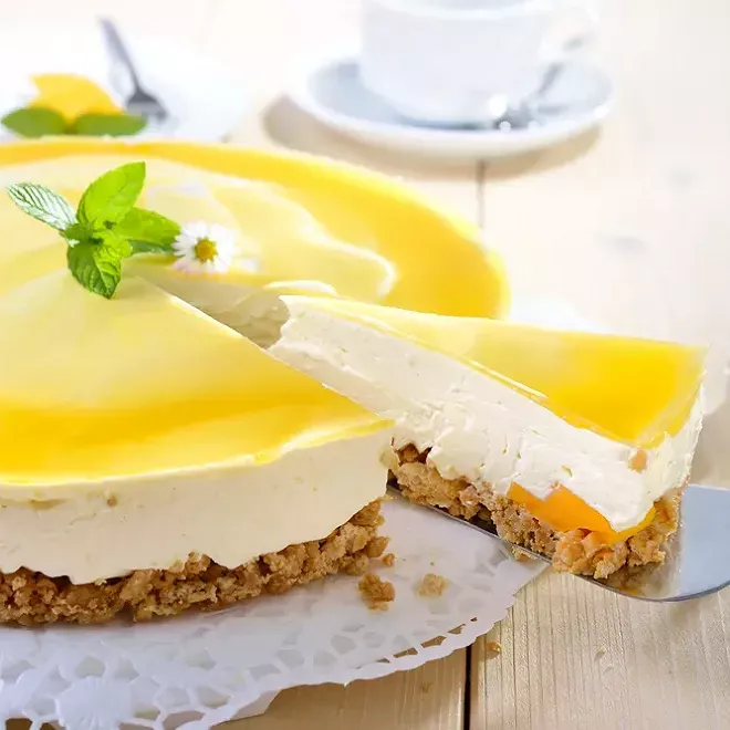 Cheesecake, biscuit maison &amp; coulis de mangue
