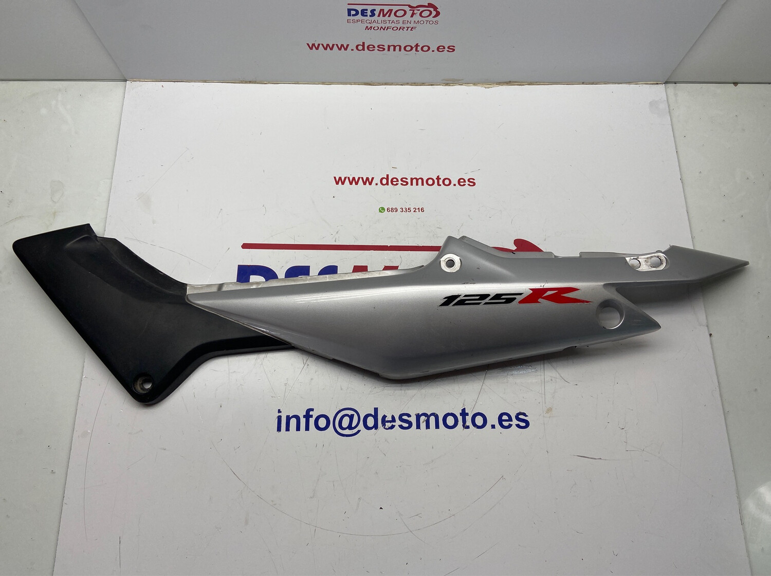 Lateral izquierdo HONDA CBR 125R 2005