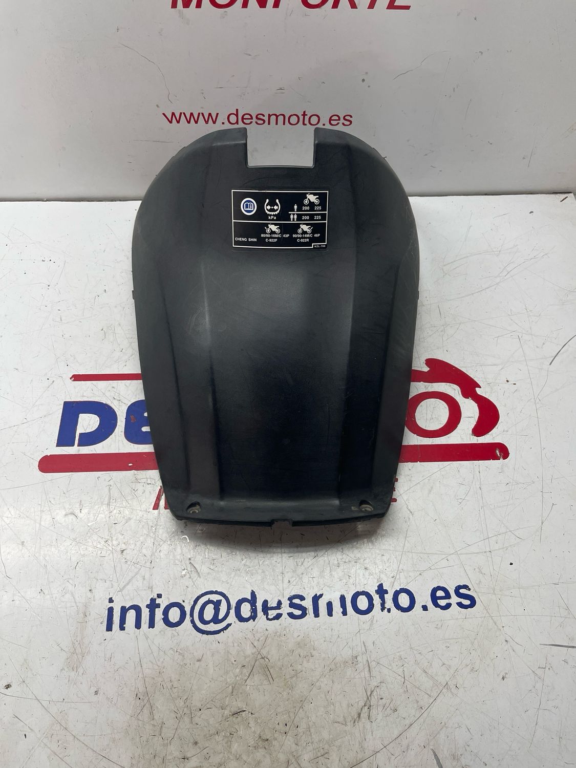 Tapa bajo asiento HONDA VISION 110 2013