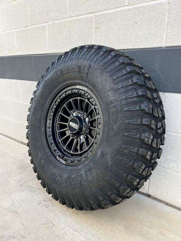 Metal FX delta 15x7 4x156 Matte Black Beadlock Wheels & 32x10-15 Arisun XD Tires  (FREE Mounted )