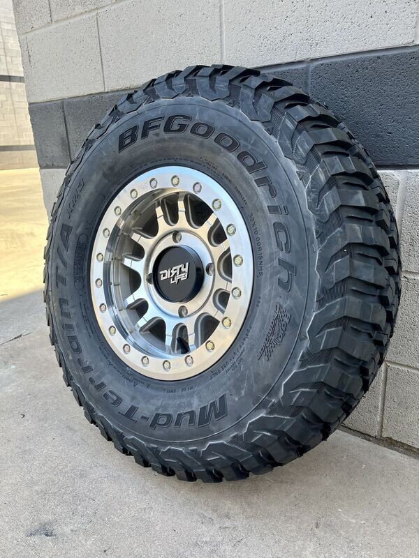Dirty life beadlock 15X7 4x137 4+3 Machine Silver Gold Bolts Wheels & 30x10-15 BF Goodrich mk3 Tires (FREE Mounted)