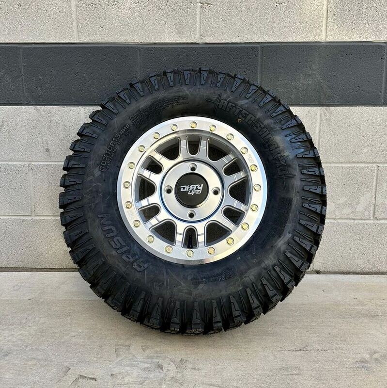 Dirty life beadlock 15X7 4x137 4+3 Machined Silver With Gold Bolts Wheels & 30x10-15 Arisun After Shock XD Tires  (FREE Mounted