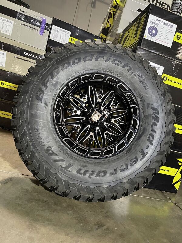 AXE 15X7 4x137 4+3 Black Milling Wheels & 30x10-15 BF Goodrich KM3 Tires  (FREE Mounted)