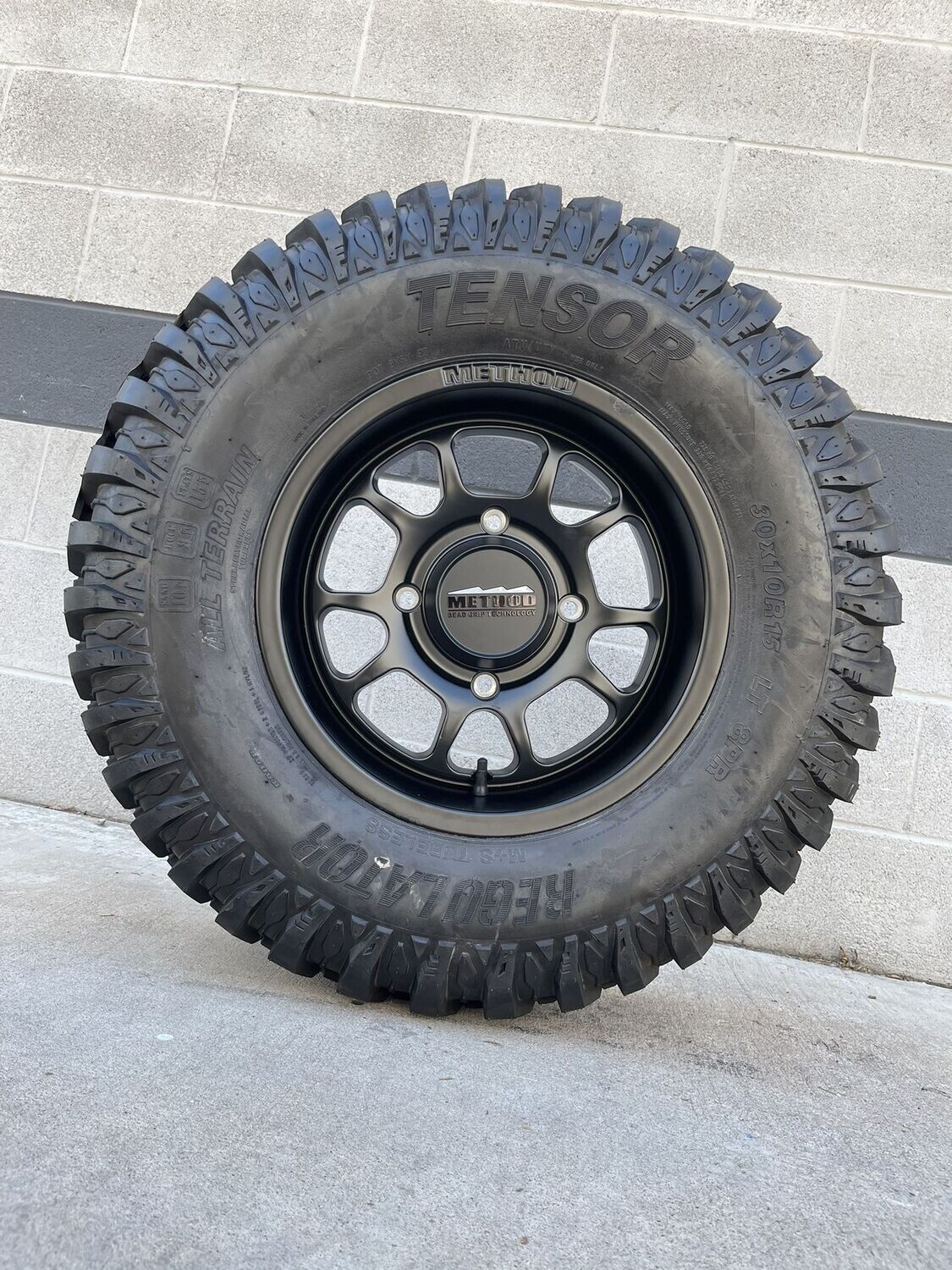 method race 15X7 4x156 Beadgrip Wheels & 30x10-15 Tensor Regulator DOT Tires (FREE Mounted