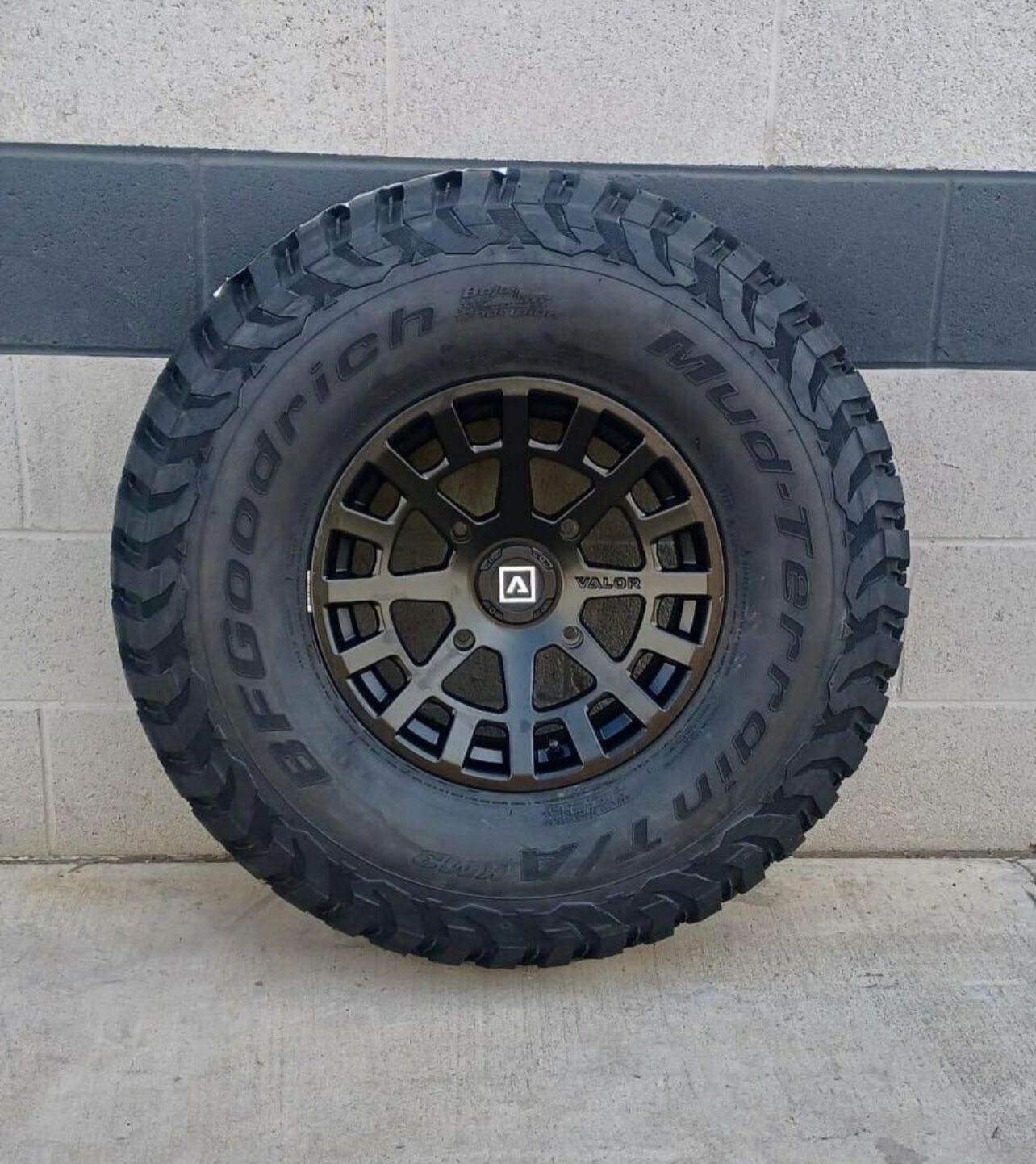 Valor 15X7 4x156 Black Wheels & 30x10-15 BF Goodrich KM3 Tires (FREE Mounted