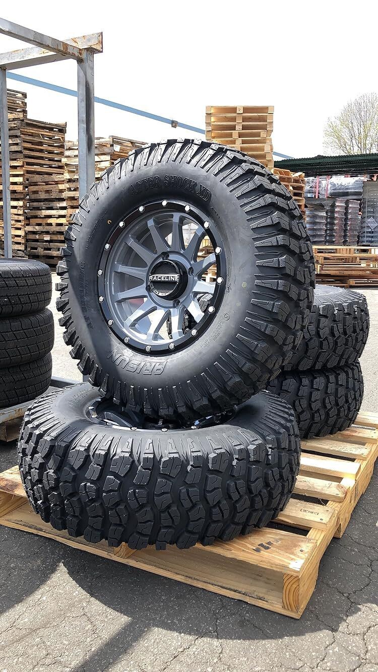 Raceline 15x7 4x156 Stealth Grey Wheels & 32x10-15 Arisun Aftershock XD  Tires  FREE Mounted
