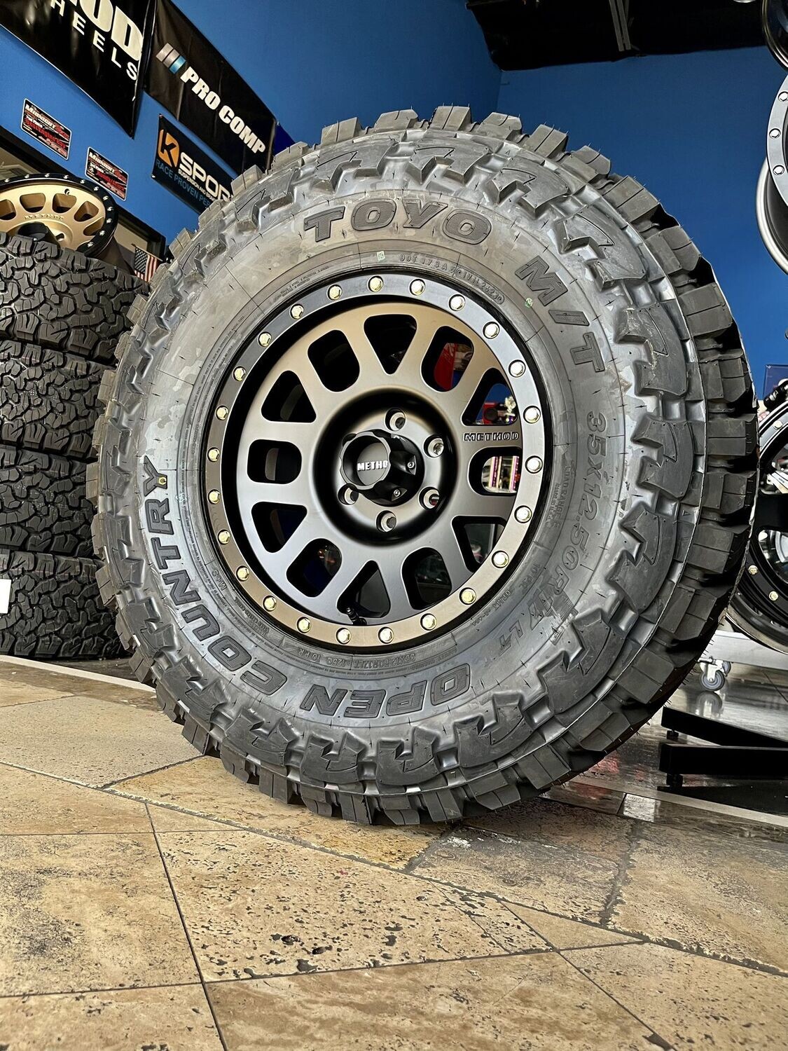 Wheel & Tire Method mr309 18x9 6x139.7 Black Wheels &  35x12.50-17 TOYO M/T Tires