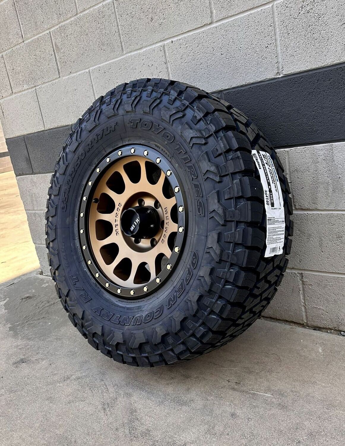 Wheel & Tire Method MR305 17X8.5 5X127 Bronze Wheels & 33X12.50R17
