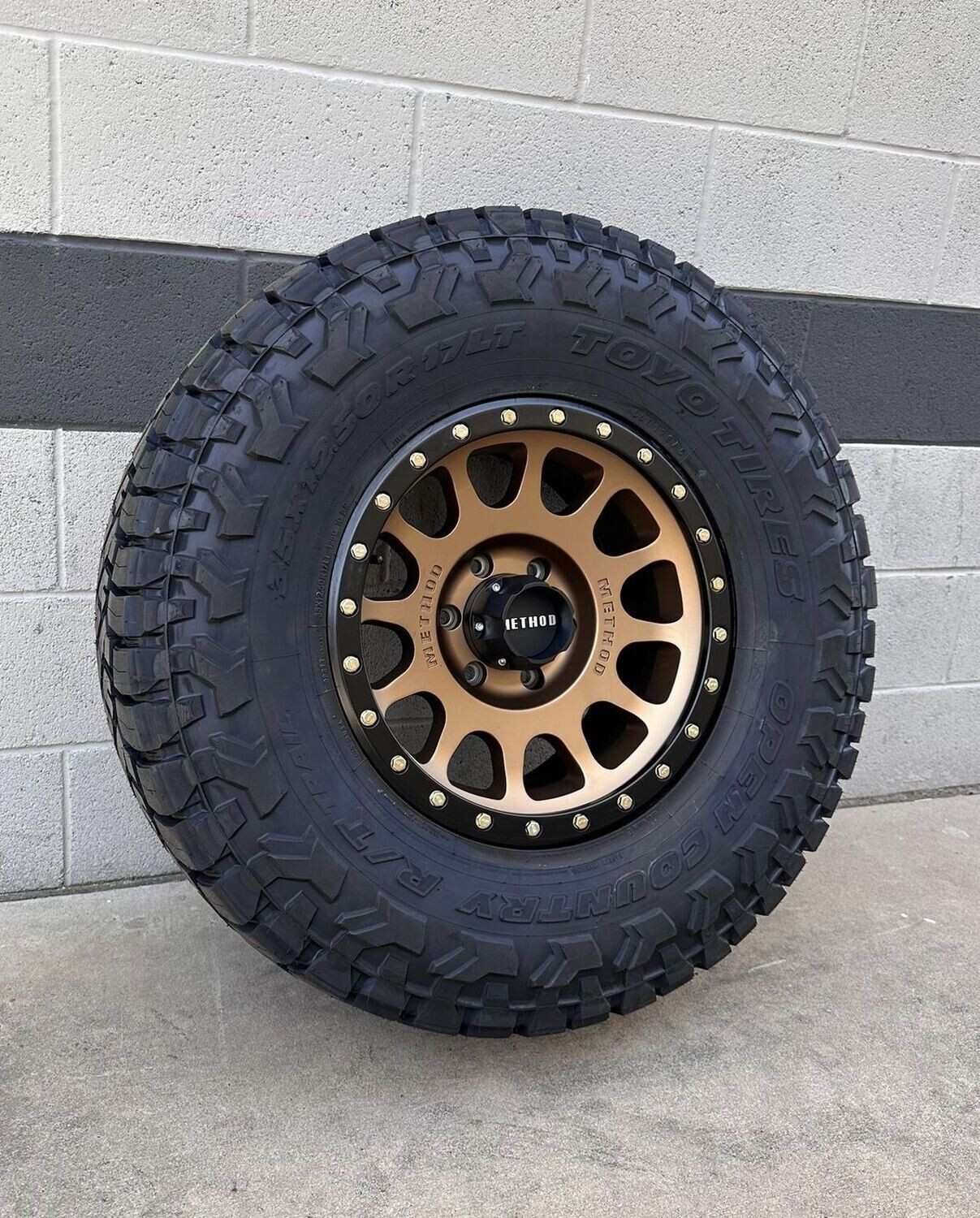 Wheel & Tire Method MR305 17X8.5 5X127 Bronze Wheels & 33X12.50R17