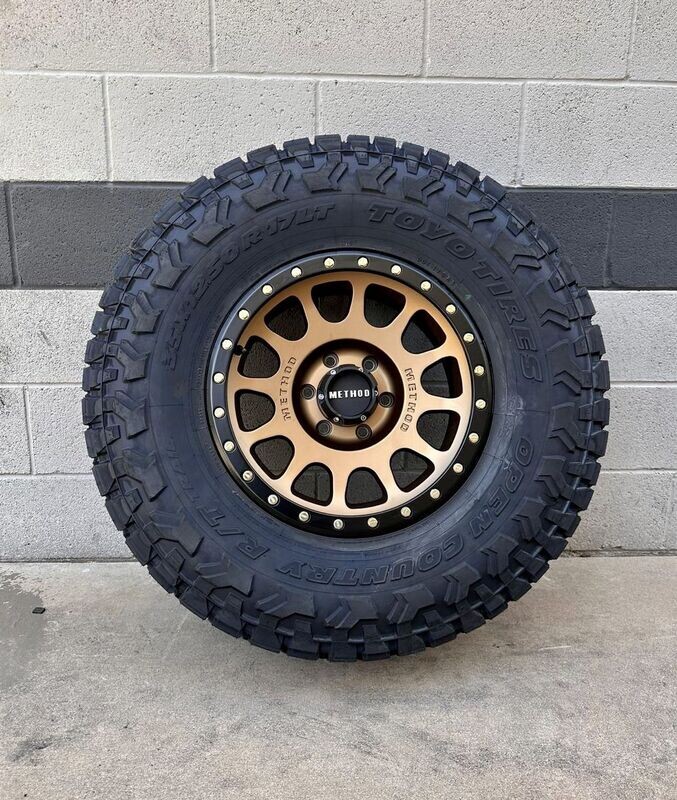 Wheel & Tire Method mr305 17X8.5 6x139.7 Bronze Wheels &  275-70-17 TOYO  RT Trail Tires