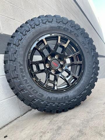 Wheel & Tire Package TRD Style17X8 6x139.7 Matte Black Wheels & 285-70-17 Toyo  R/T Trail  Tires
