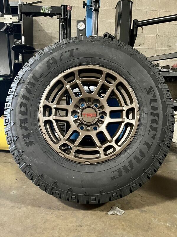 Wheel & Tire Package TRD Style17X8 6x139.7 Matte Bronze Wheels & 285-70-17 Suretrac A/T Tires
