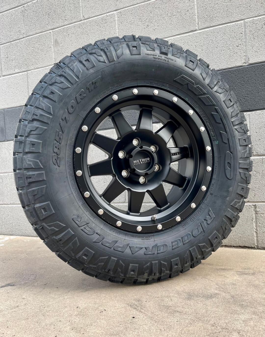 Wheel & Tire Package Method MR304 17X8.5 6x139.7 Black Wheels &  285-70-17 Nitto Ridge Grappler Tires