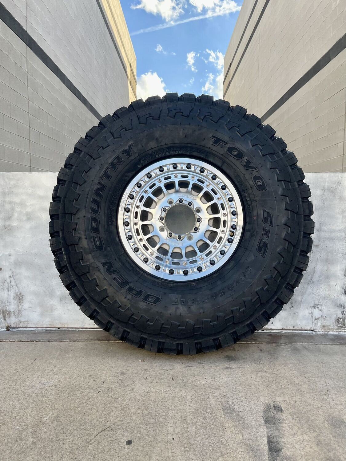 Metal FX delta 15x6 4x156 Beadlock Machine Silver Wheels & 32x9.5-15 TOYO SXS Tires