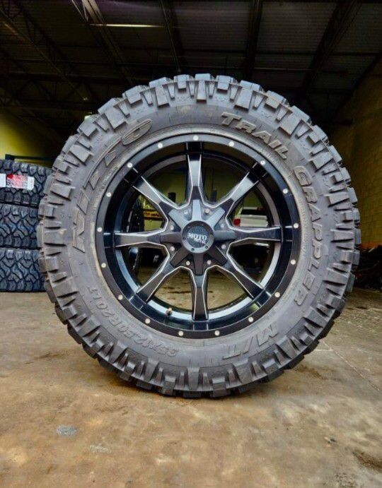 Wheel & Tire Moto Metal MO970 20x10 5X139.7/5X150 Black Mill Wheels & 35x12.50R20 Nitto Ridge Grappler 12ply Tires