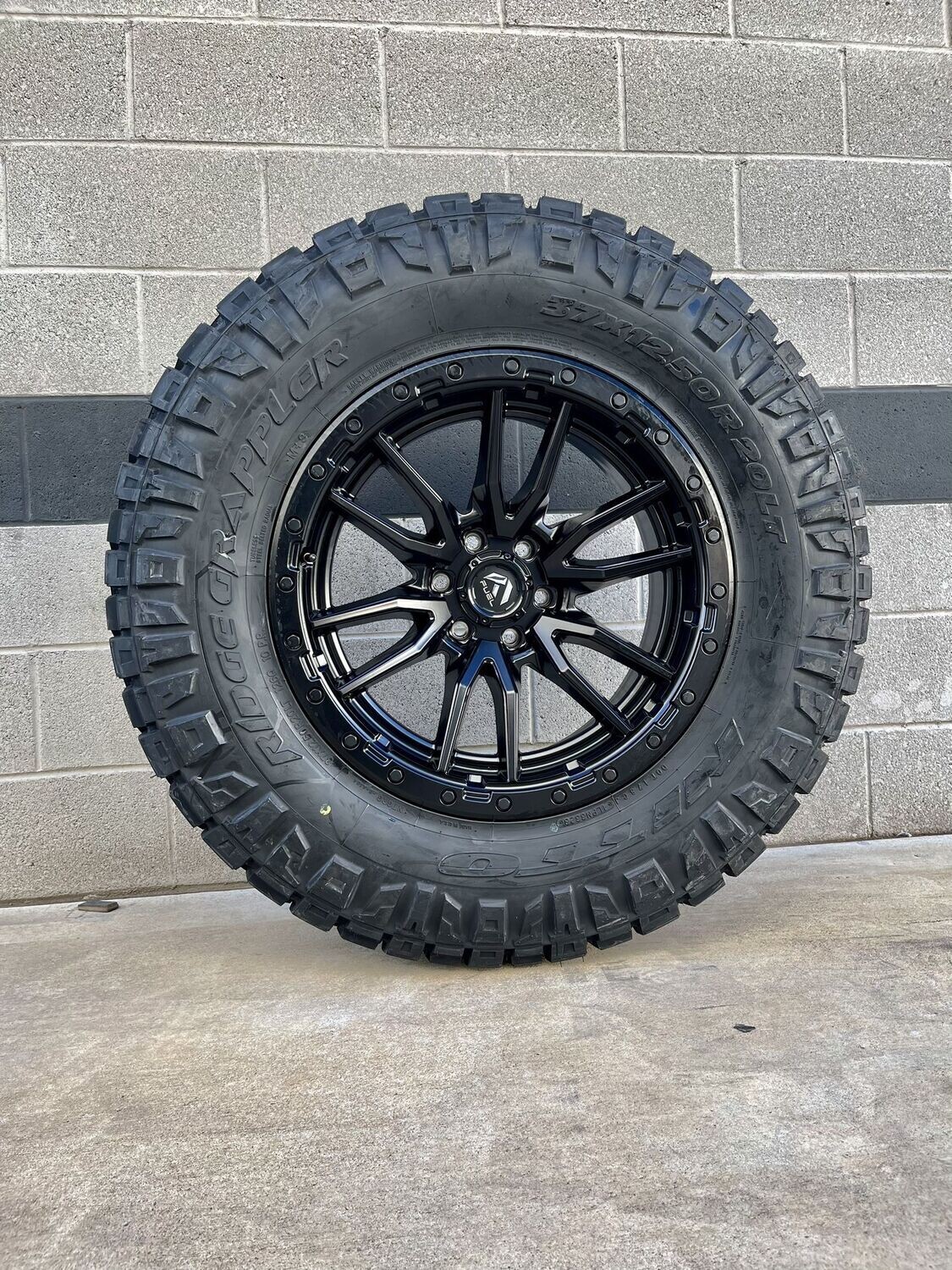 Wheel & Tire Package Fuel Rebel 17X9 6x139.7 Satin Black Wheels & 35X12.50R17 Nitto Ridge Grappler Hybrid Tires