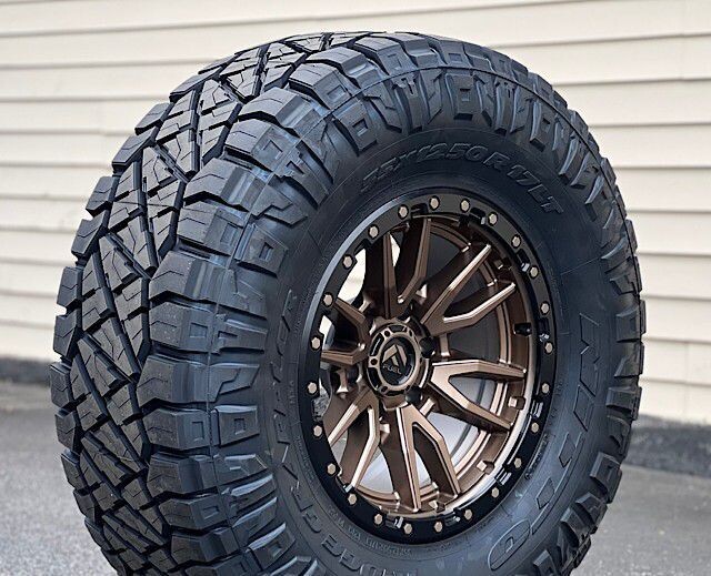 Wheel & Tire Package Fuel Rebel 18X9 6x139.7 Bronze Wheels & 35X12.50R18 Nitto Ridge Grappler Hybrid Tires