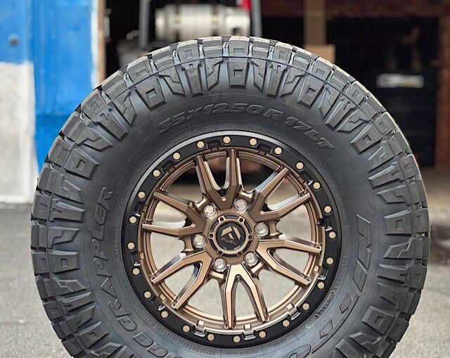 Wheel & Tire Fuel Rebel 17x9 6x135 Bronze Wheels & 285-70-17 Nitto