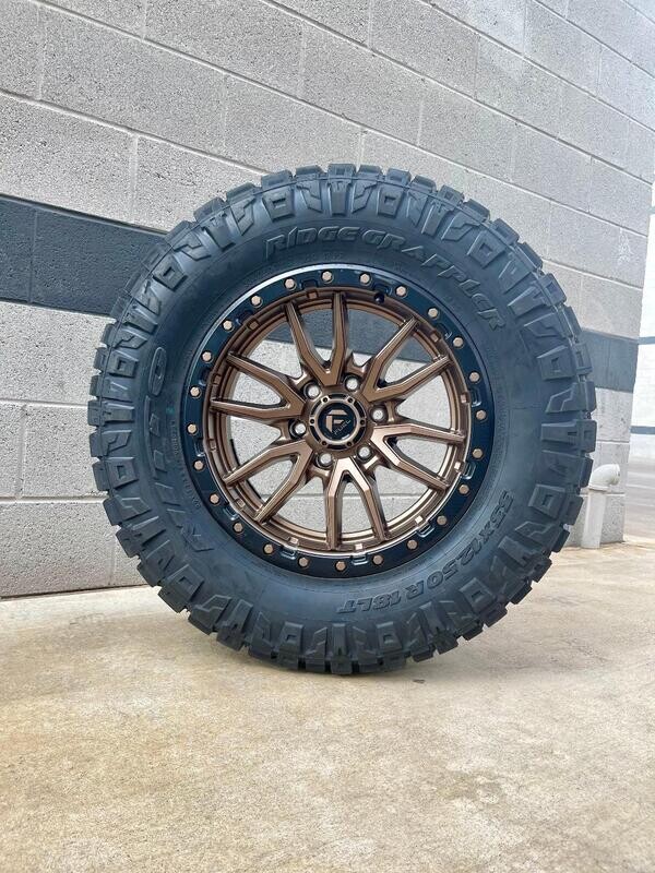 Wheel & Tire Fuel Rebel 20x10 6x139.7 Bronze Wheels & 33X12.50R20 Nitto Ridge Grappler Hybrid Tires