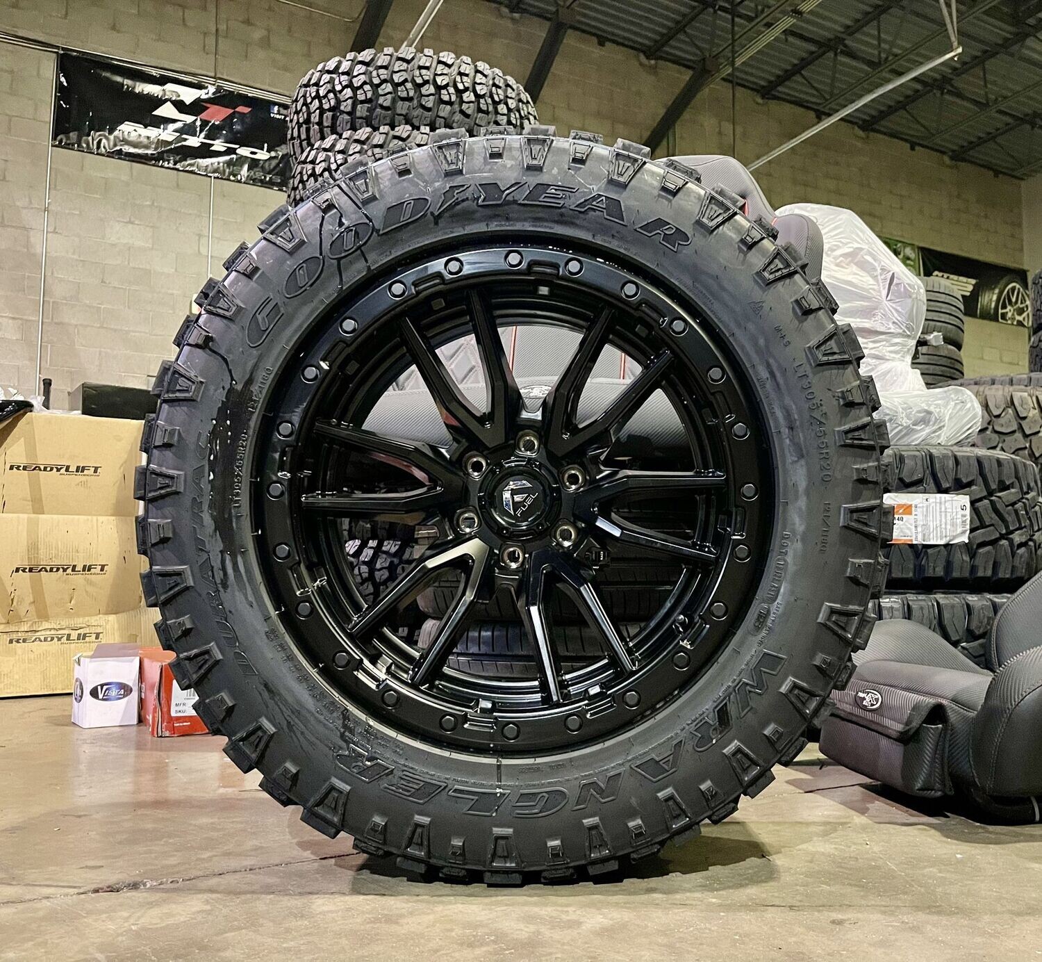 Wheel & Tire Fuel Rebel 20x10 6x135 Satin Black Wheels & 305-55R20 Goodyear Wrangler Duratrac M/T Tires