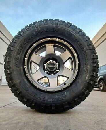Wheel & Tire Raceline Boost 20x9 5X150 Gunmetal Wheels & 33x12.50R20 Nitto Ridge Grappler 12ply Tires
