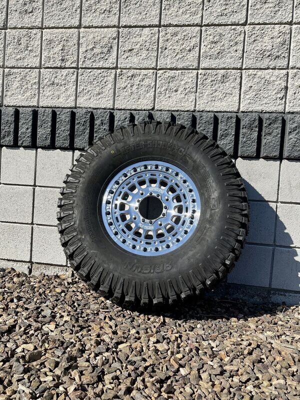 Metal FX 15X6 4X137 Beadlock Machine Silver Wheels & 32x10R15 Arisun Aftershock XD Tires