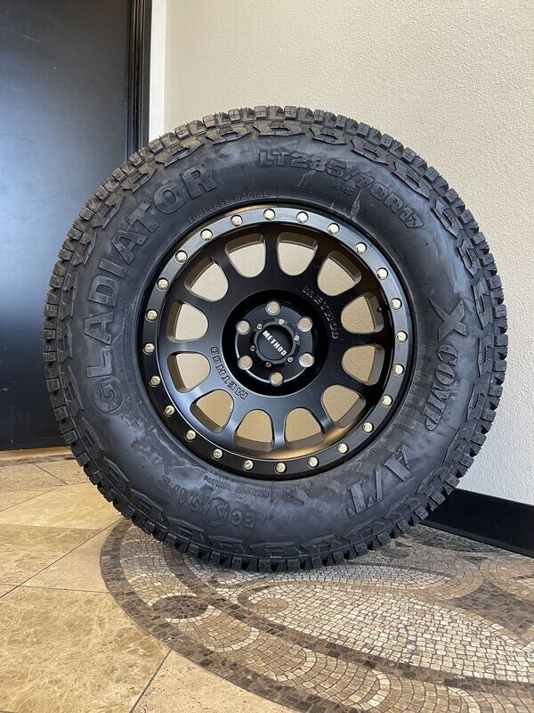 Wheel & Tire Package Method MR305 17X8.5 6X139.7 Matte Black Wheels & 285-70R17 Gladiator X Comp A/T Tires