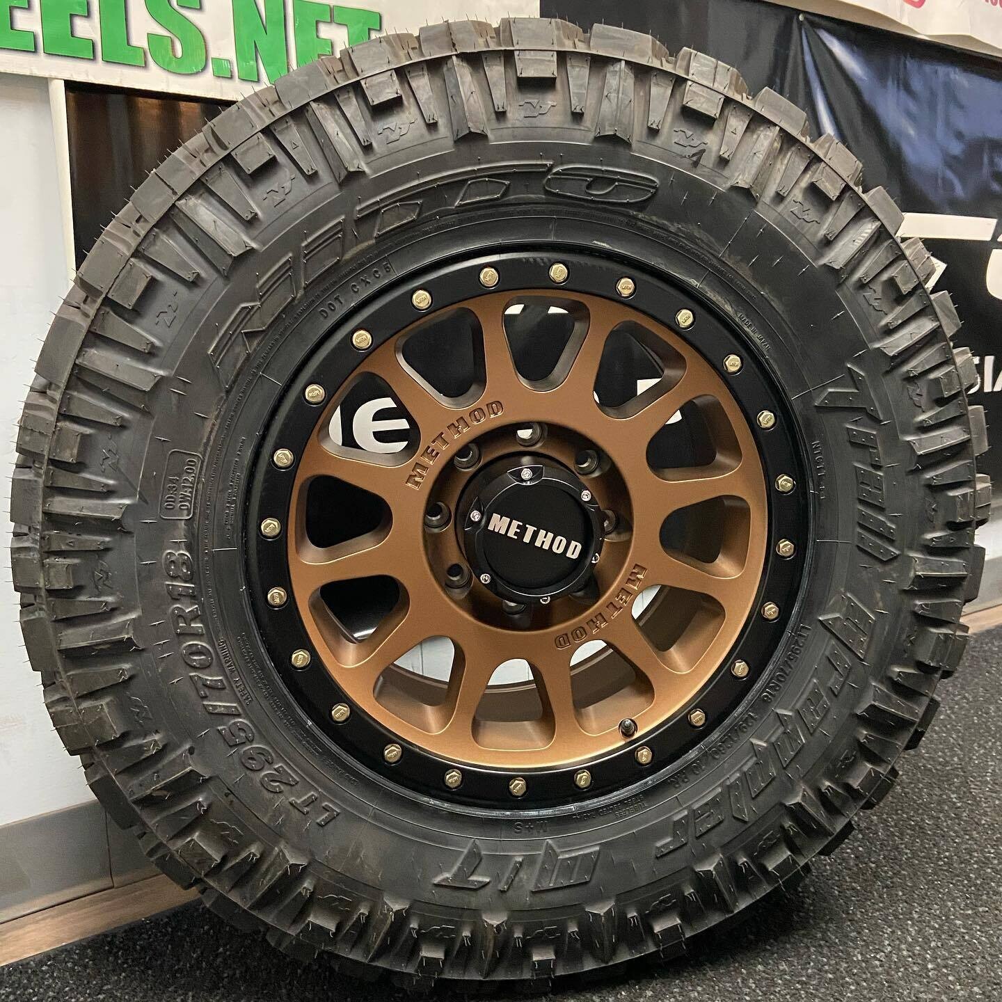 Wheel & Tire Method Race MR305 20x10 6X139.7 -18 Bronze Wheels & 35x12.50R20 Nitto Trail Grappler M/T Tires