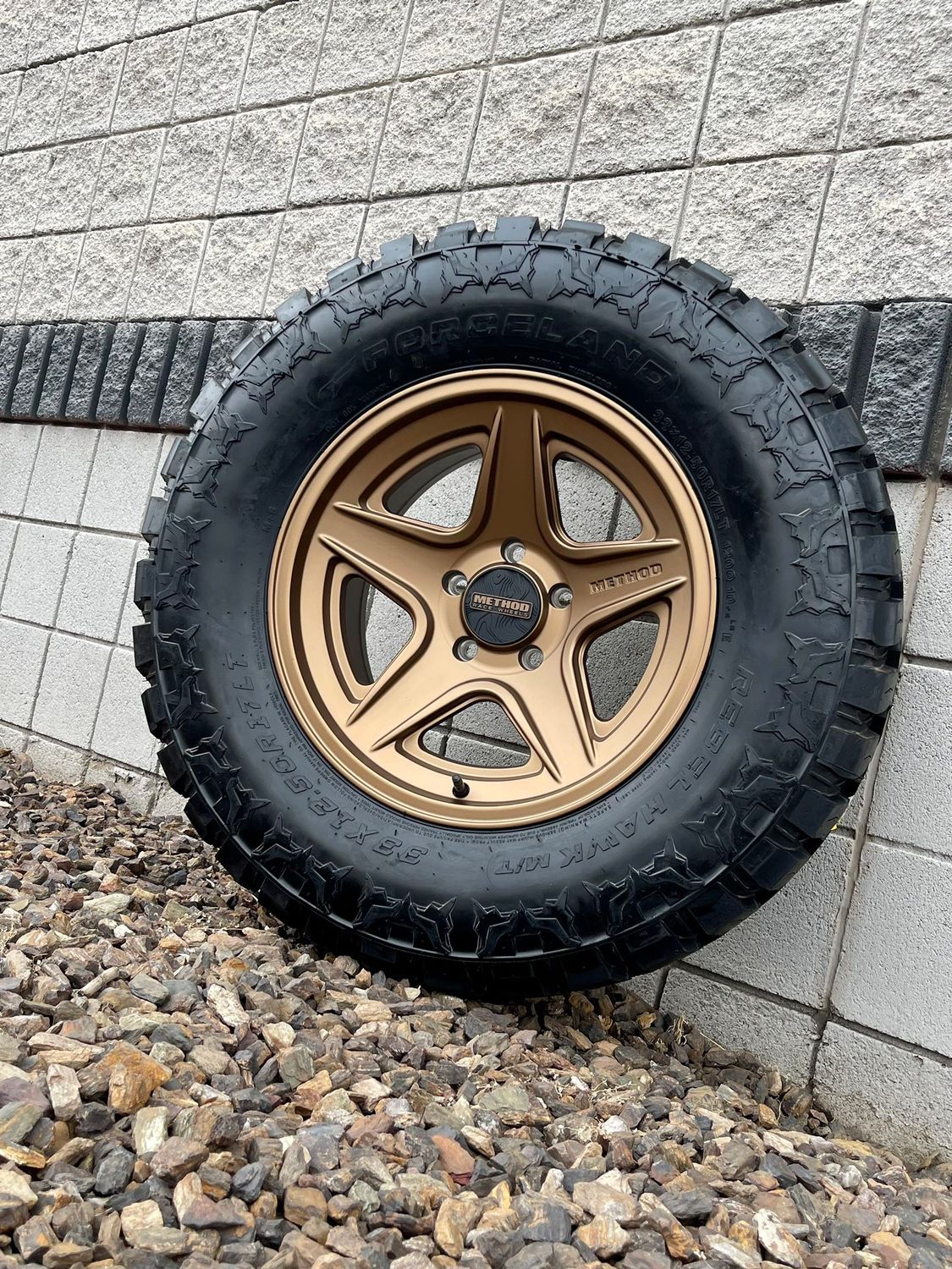 4 Wheel & Tire Method Race MR319 17x8.5  6x135 Bronze Wheels & 35x12.50-R17LT Forceland Rebel Hawk M/T Tires